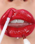 Model wearing Makeup Revolution Fantasy Lip Kit - Fire