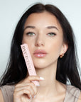 Model holding nstaLash LashBOOST Mascara with Growth Stimulating Serum