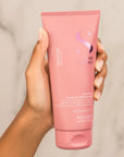 Model holding Alfaparf Milano Semi Di Lino Moisture Nutritive Leave-In Conditioner