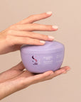 Model holding Alfaparf Milano Semi Di Lino Smooth Smoothing Mask