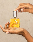 Model holding Alfaparf Milano Semi Di Lino Sublime Cristalli Liquidi