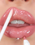Model wearing Makeup Revolution Fantasy Lip Kit - Air