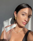 Model holding Indeed Labs Nanoblur