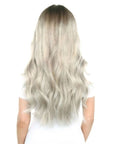 Model wearing BEAUTY WORKS 20" Double Clip-In Hair Extensions, back view