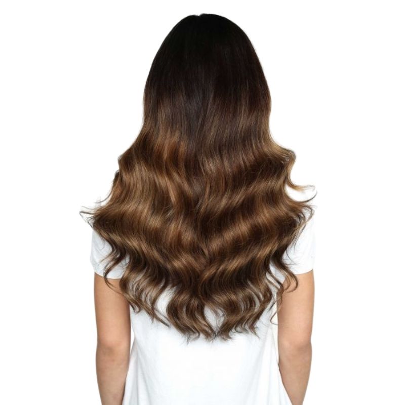Beauty Works 20"Model wearing Beauty 20" Deluxe Remy Instant Clip-In Extensions, back view