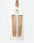 Model holding Beauty Works HAIRDROBE