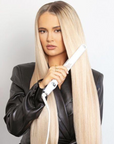 Molly-Mae using Beauty Works X Molly Mae Hair Straightener Kit
