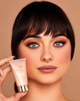 Model using INGLOT Rosie For Inglot 365 Skin Perfector in Soft Glow