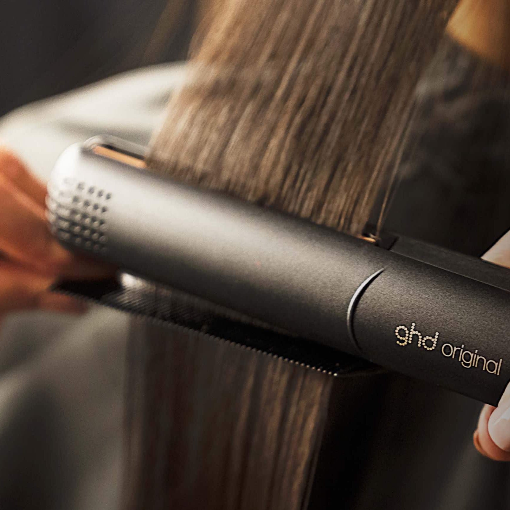 Hairdresser using GHD Original Styler