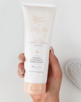 Model holding BEAUTY WORKS X MOLLY-MAE VANILLA GLOSS LOCKS MASK 250ml