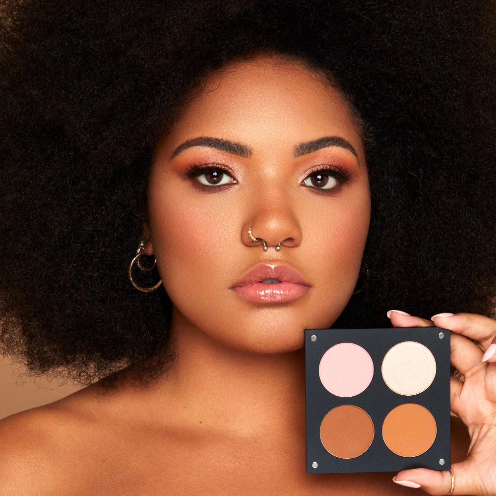 Model holding INGLOT Rosie For Inglot Afterglow Skin Palette - Bronze Glow
