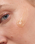 Model wearing The Inkey List OAT CLEANSING BALM