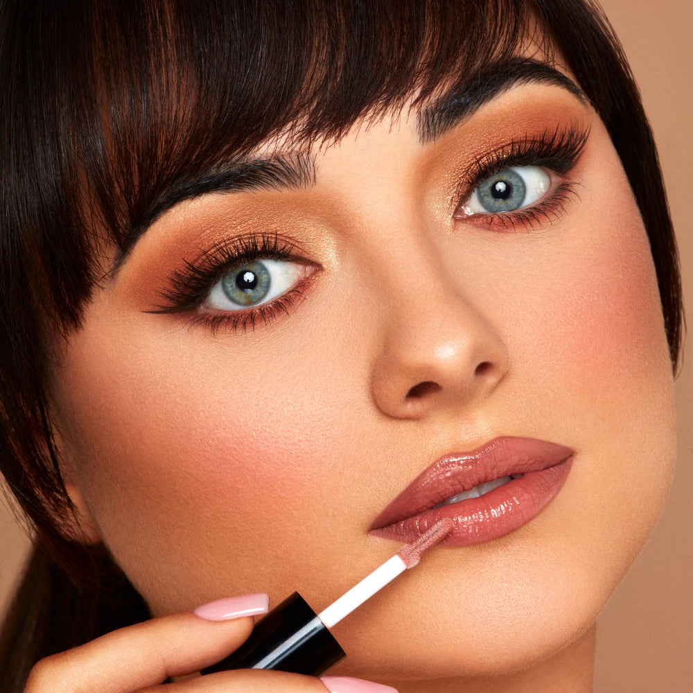 Model wearing INGLOT Rosie For Inglot Luminous Crystal Lip Glaze - Luminous Nude