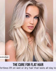 Model with hair styled with Color Wow Raise the Root Thicken & Lift Spray