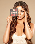 Maura holding INGLOT X MAURA Beautiful Storm Eyeshadow Palette