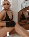 Model applying Vani-T Velocity Express Tanning Mousse