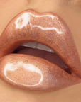 Model wearing DOLL BEAUTY Doll Gloss