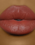 Model wearing DOLL BEAUTY She Fine Liner - Bo$$ Lady