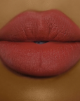 Model wearing DOLL BEAUTY She Fine Liner - Lips Don't Lie