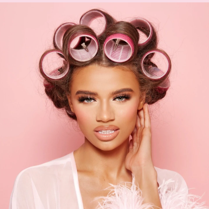 Model wearing DOLL BEAUTY Esmerelda Faux