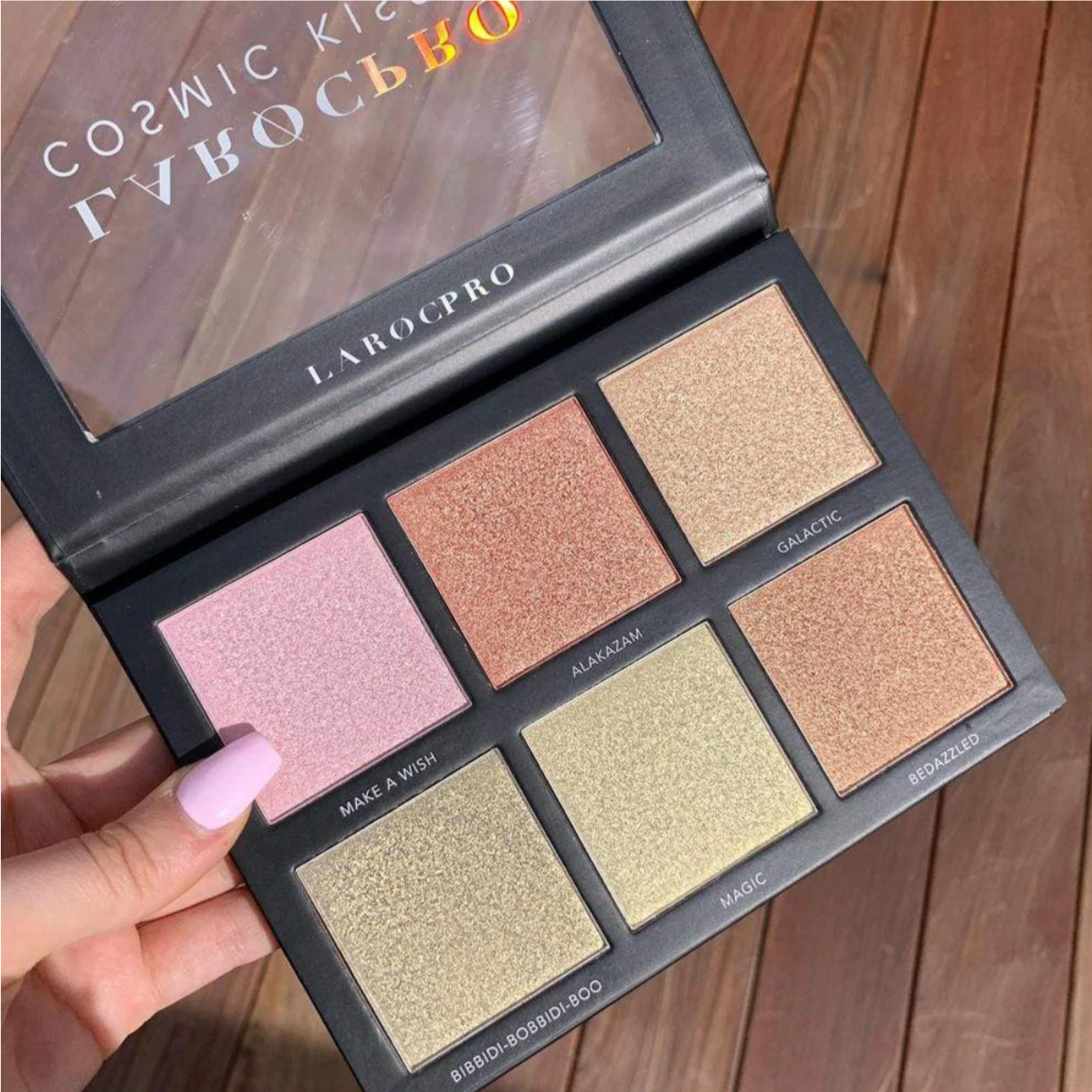 Model holding LaRoc PRO Cosmic Kisses