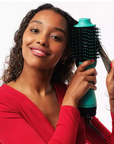 Model using Revlon One-Step Hair Dryer And Volumizer