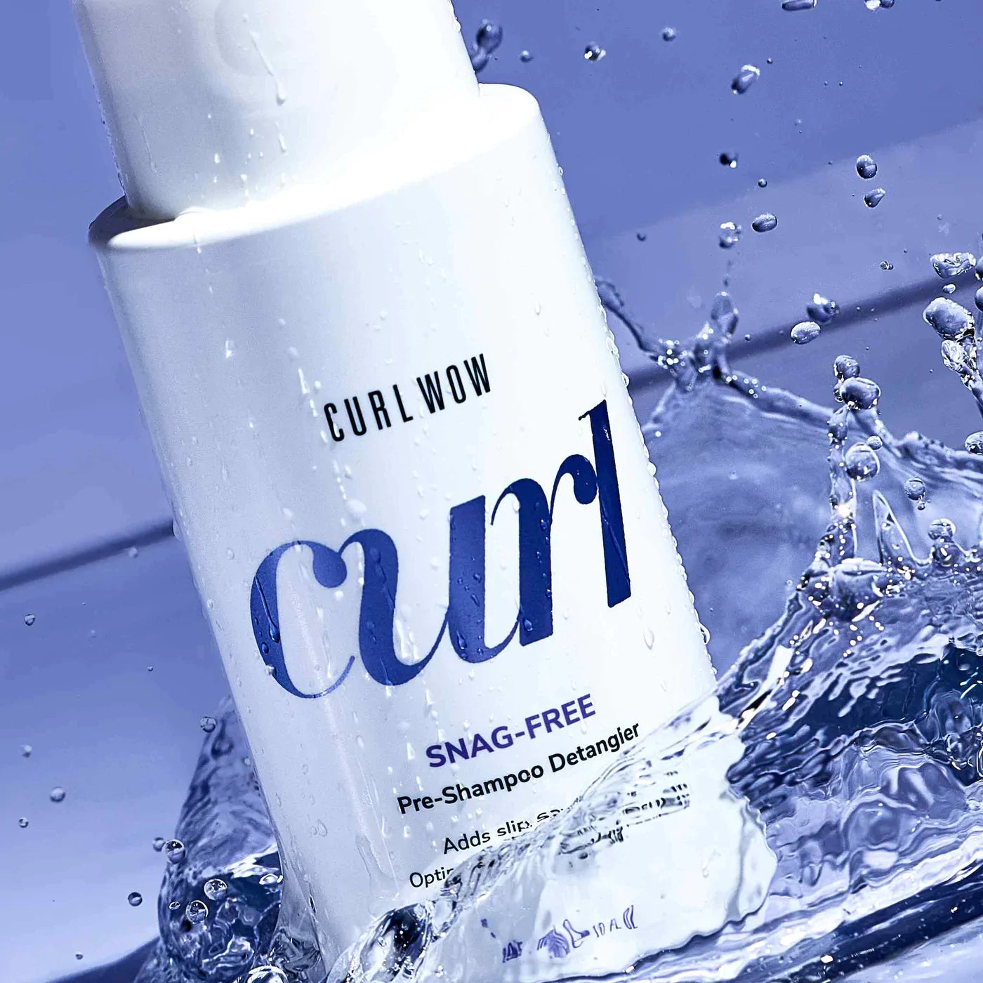 Color Wow Snag-Free Pre-Shampoo Detangler, with water splash