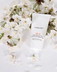 Inglot Under Makeup Base SPF20 with white flowers