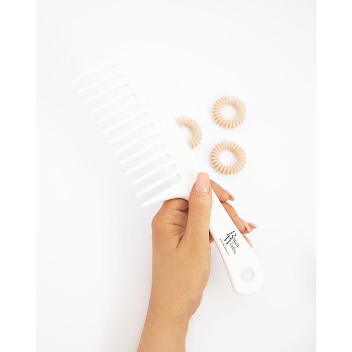Modeling holding Beauty Works Beach Wave Comb