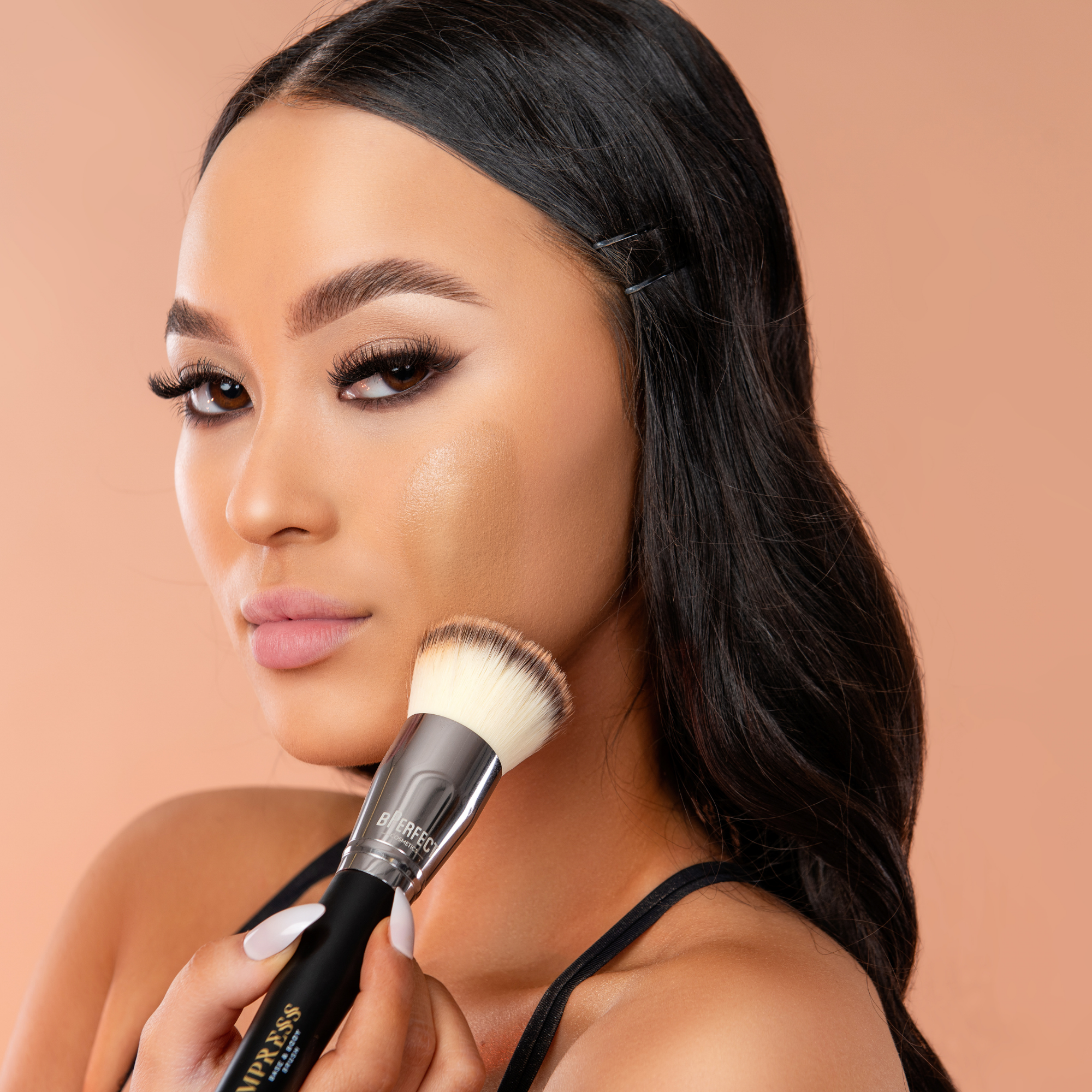 Model using bPerfect EMPRESS BASE & BODY BRUSH on face