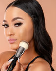 Model using bPerfect EMPRESS BASE & BODY BRUSH on face