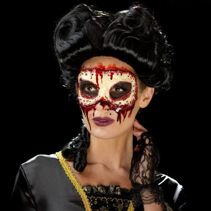 Model wearing Smiffys Masquerade Face Off Prosthetic, against black background
