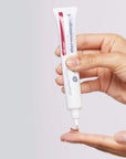 Model holding Dermalogica Skinperfect Pprimer SPF30