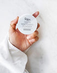 Model holding Polished London Teeth Whitening Powder