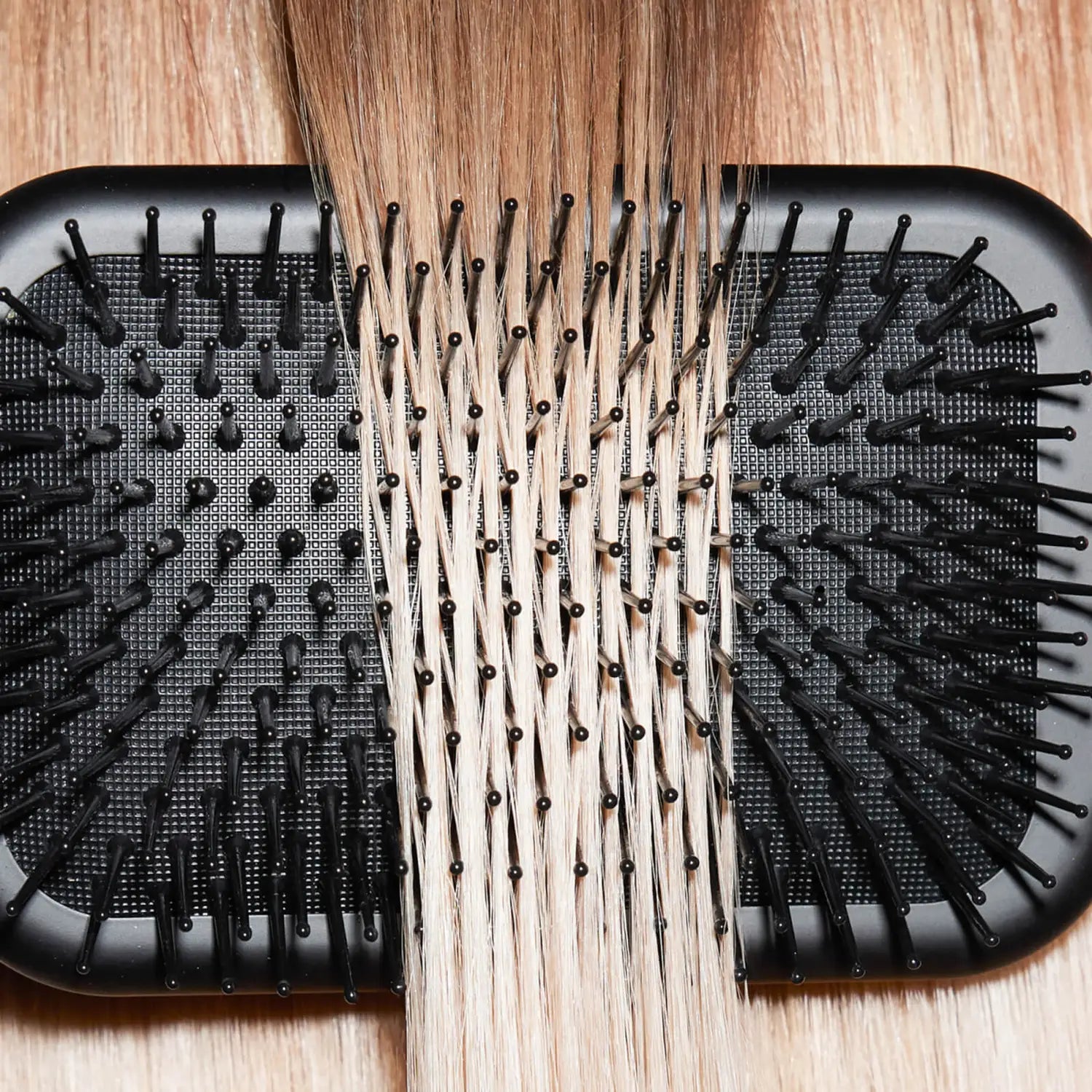 ghd The All Rounder - Paddle Brush, brush through blonde hair