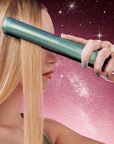 Model using ghd Platinum+ Hair Straightener In Alluring Jade