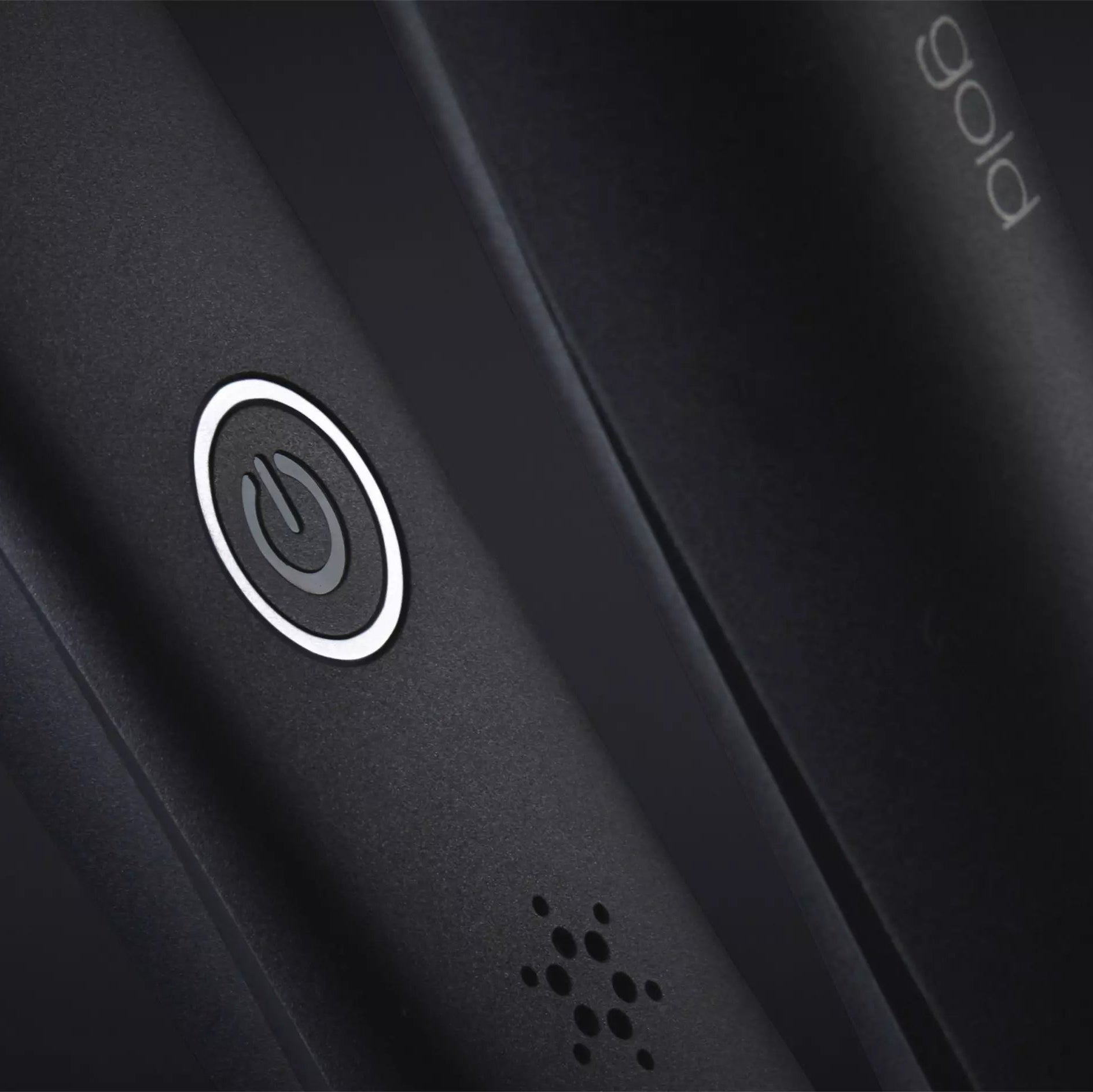 Close up of power button on ghd Gold Hair Straightener 