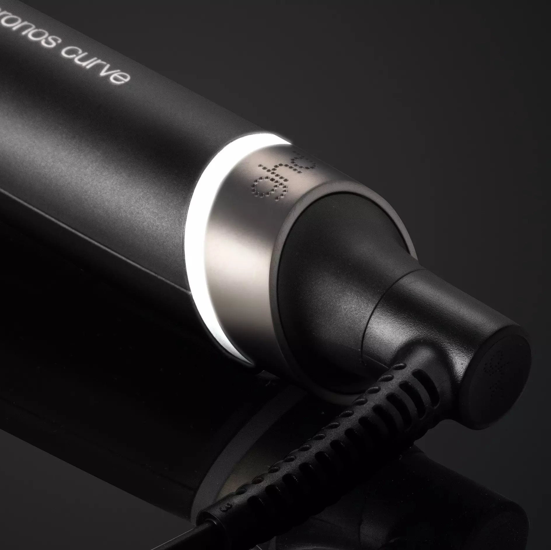 Close up of swivel lead from the ghd Chronos Curve Conical Wand 