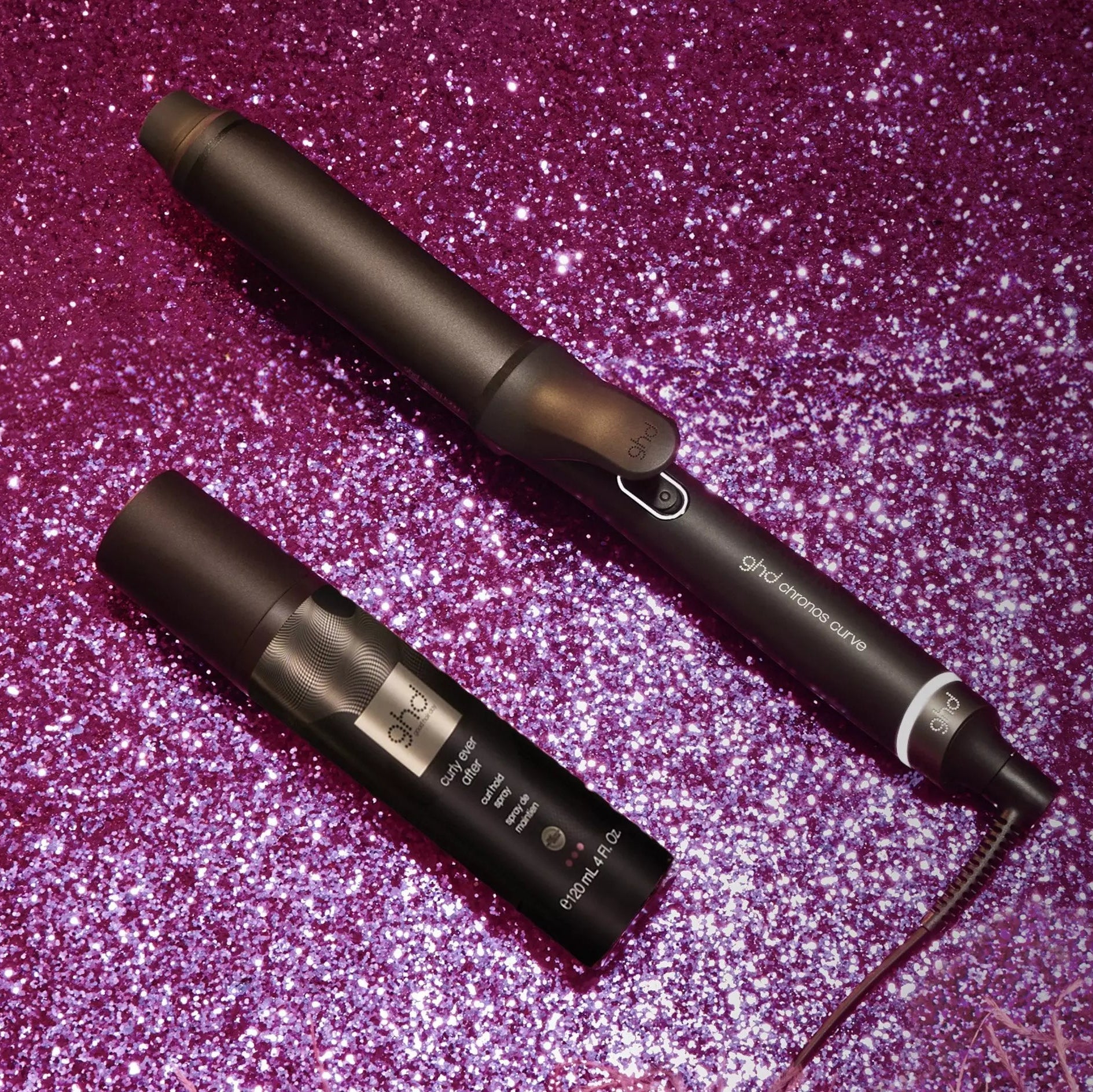 ghd Chronos Curve Grand Tong and curly ever after on a pink sparkly background 