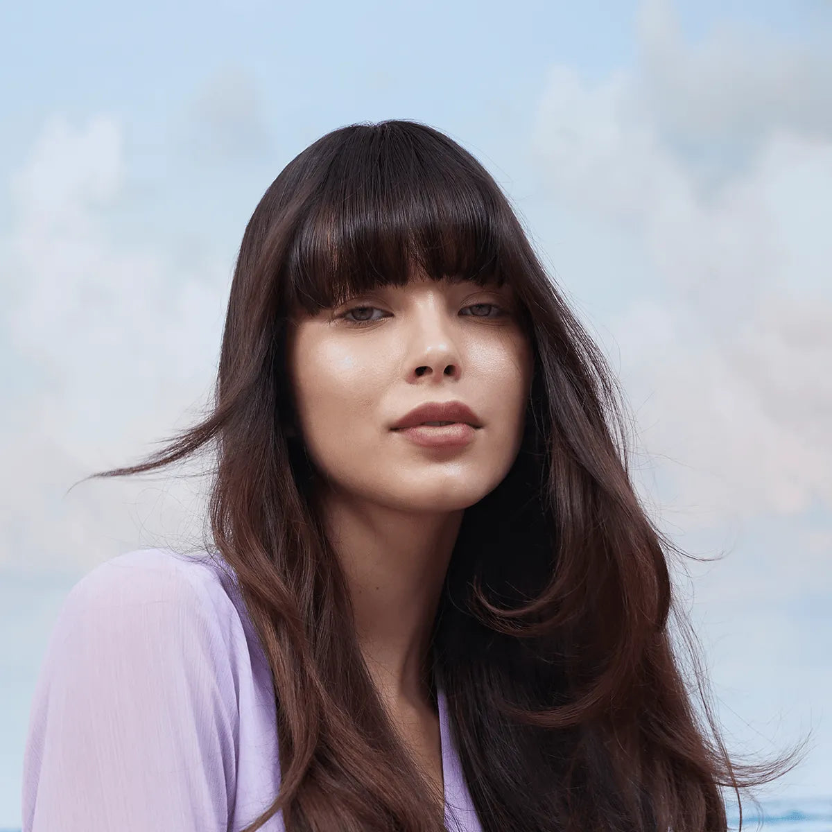 Model who uses Alfaparf Milano Semi Di Lino Brunette Anti-Orange range 