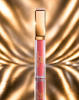 Dominic Paul Matte Liquid Lipstick Thai Spice in gold background