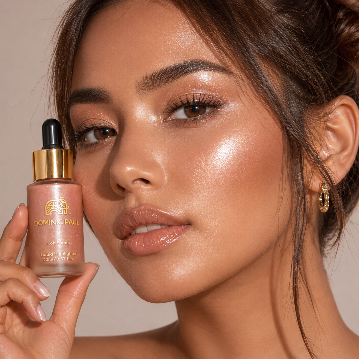 Dark heaired model wearing Dominic Paul Liquid Highlighter Koh Sami