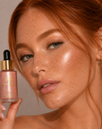 Red haired model wearing Dominic Paul Liquid Highlighter  Koh Samui