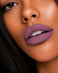 Model wearing Dominic Paul Matte Liquid Lipstick Sawadee