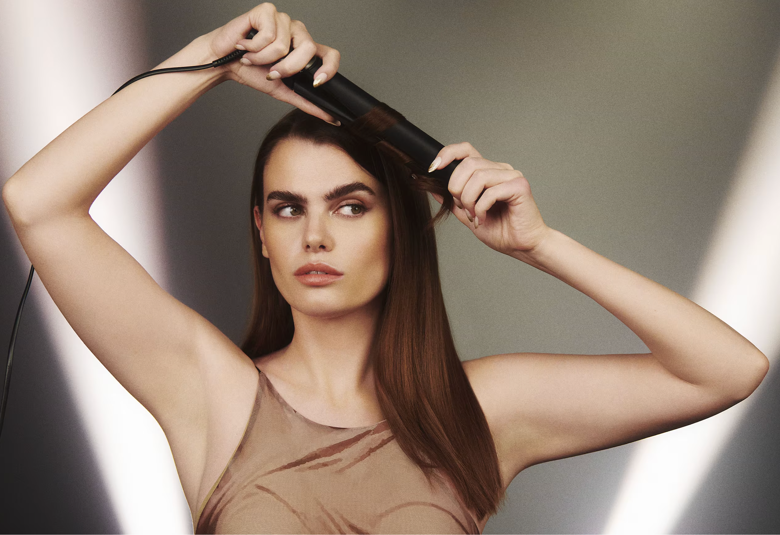 Model using ghd Chronos - Professional Hair Styler
