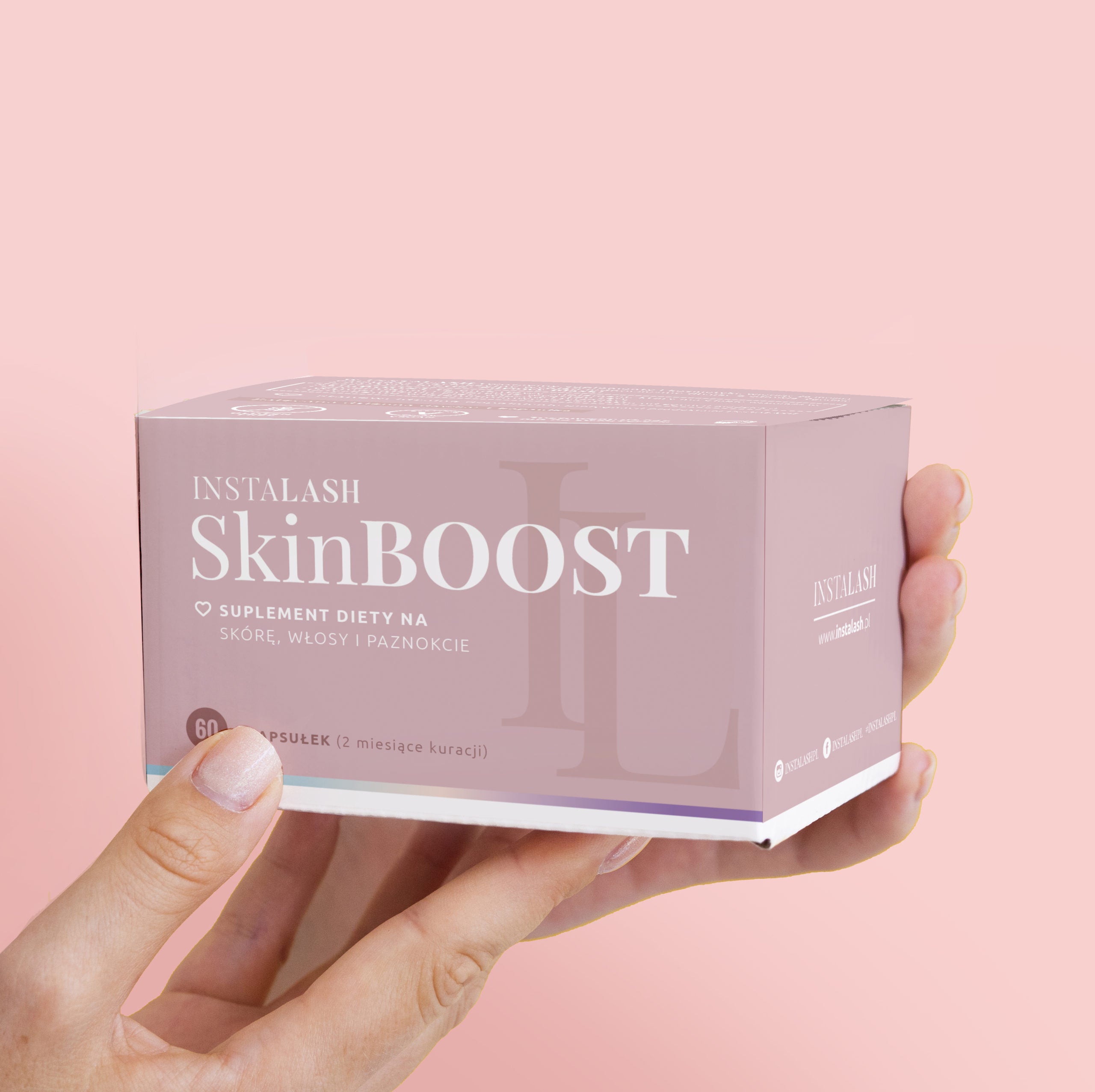 Model holding Instalash SkinBOOST – Dietary Supplement for Skin, Hair, Eyelashes & Nails 60 capsules, packaging