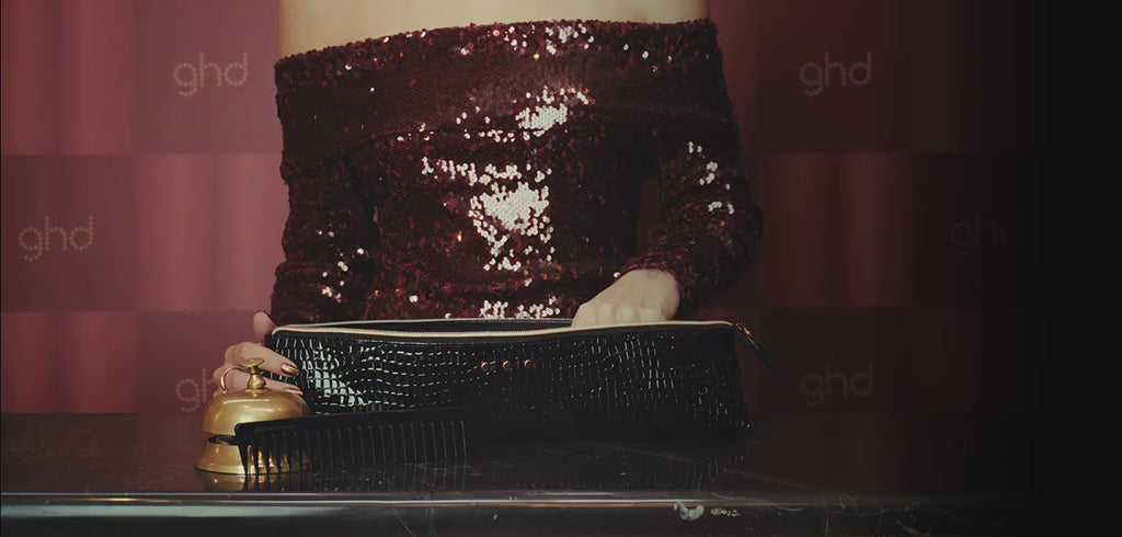 Video of model using ghd Chronos Curve Conical Wand 