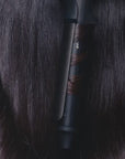 Video showing the ghd Chronos Curve Classic Tong (26mm Barrel) curing brunette hair