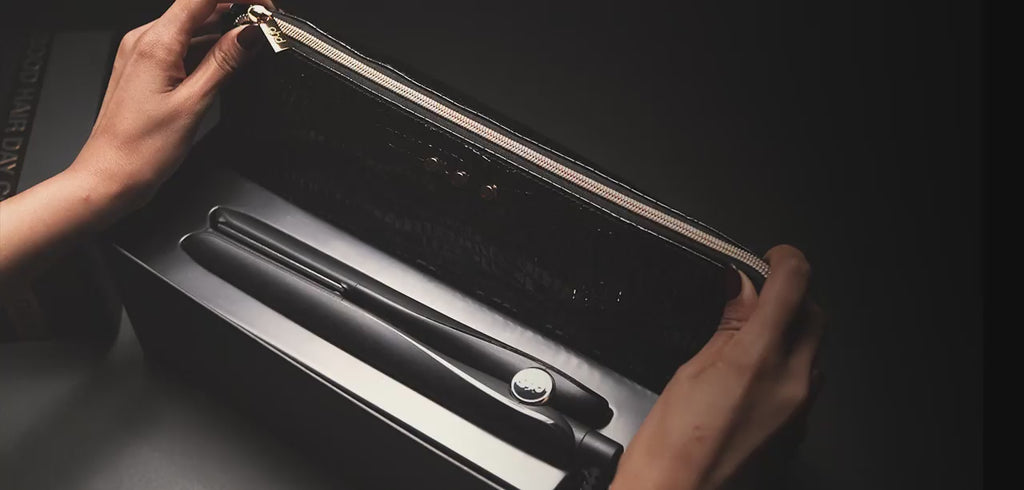 Model unboxing ghd Gold Hair Straightener Gift Set 