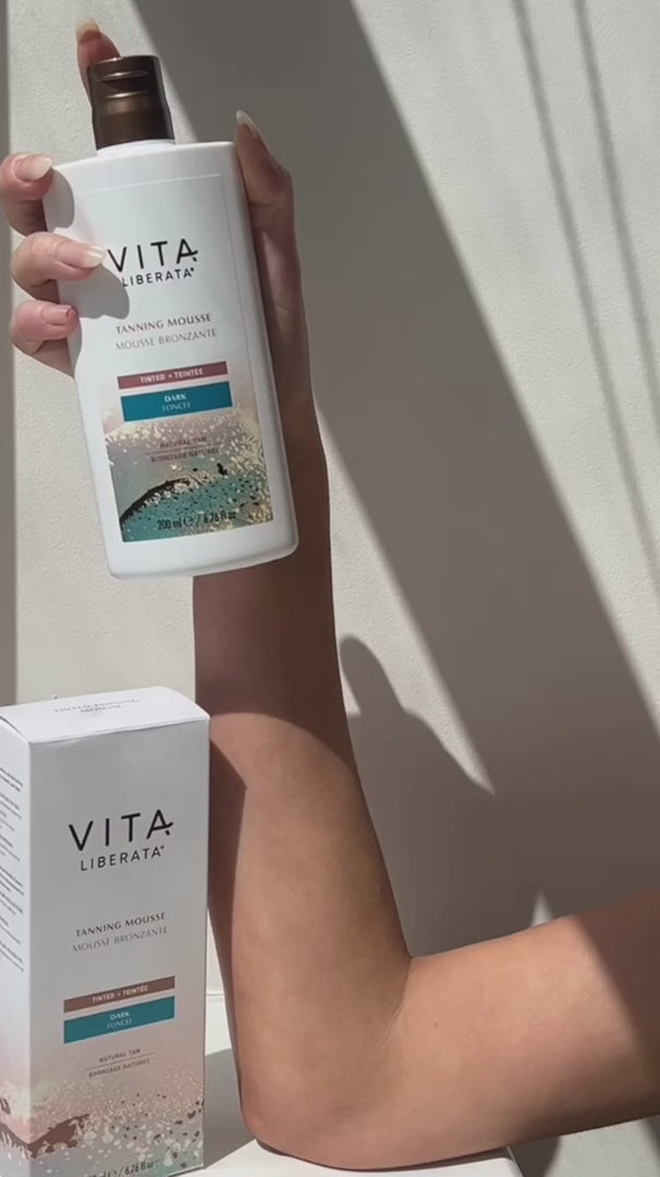 Video of model applting Vita Liberata Clear Tanning Mousse - Dark to arm